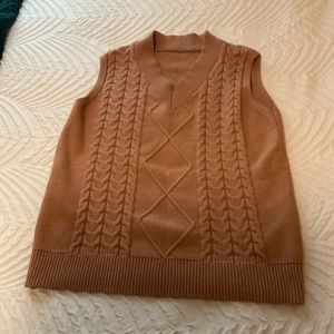 Tan colored sweater vest